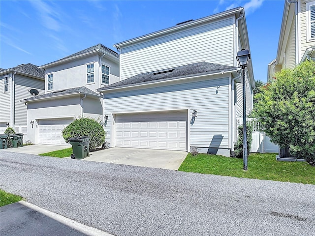 1513 Resolute St, Celebration, FL 34747 - traditional-style home with concrete driveway and an attached garage