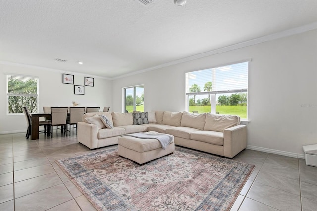 3255 Hilltop Cir, Bradenton, FL 34211 - living area with light tile patterned flooring, ornamental molding, and healthy amount of natural light