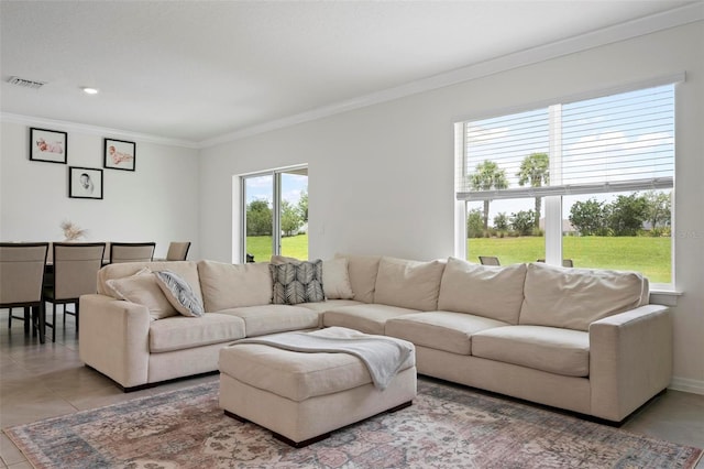 3255 Hilltop Cir, Bradenton, FL 34211 - living room with ornamental molding and light tile patterned floors