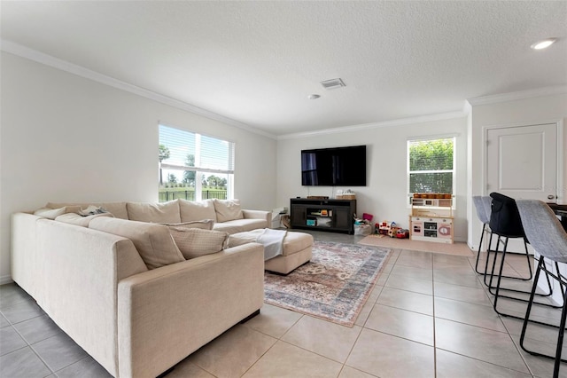 3255 Hilltop Cir, Bradenton, FL 34211 - living area featuring crown molding, light tile patterned floors, and a textured ceiling