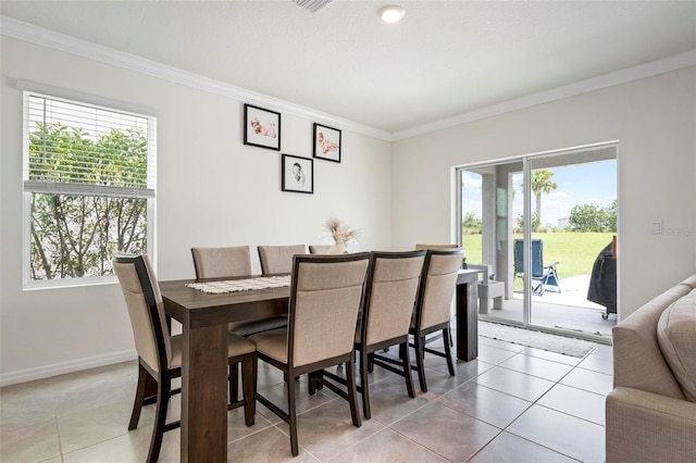 3255 Hilltop Cir, Bradenton, FL 34211 - dining room featuring crown molding and light tile patterned flooring