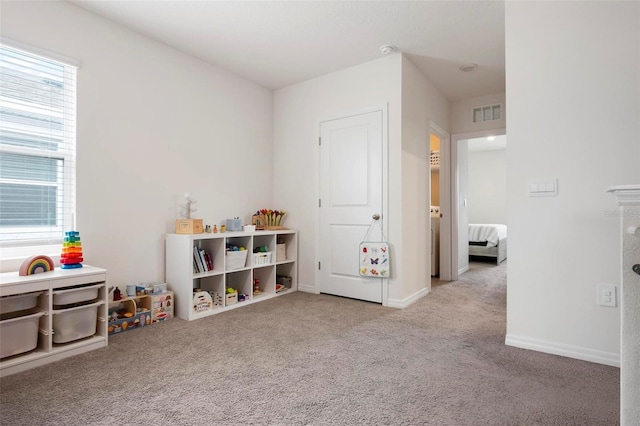3255 Hilltop Cir, Bradenton, FL 34211 - playroom with carpet and baseboards