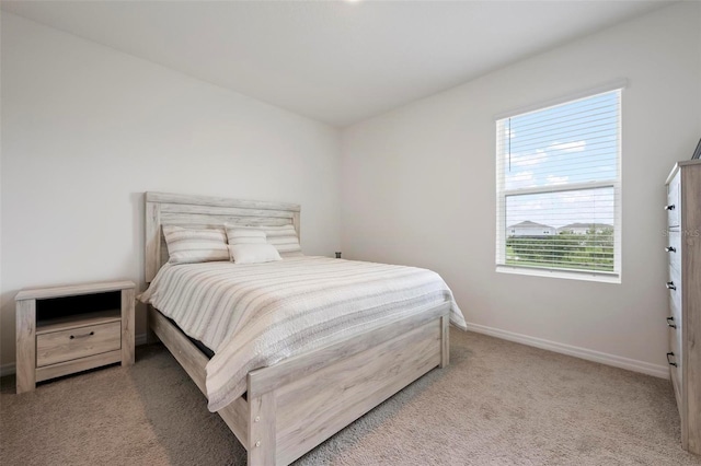 3255 Hilltop Cir, Bradenton, FL 34211 - carpeted bedroom with baseboards