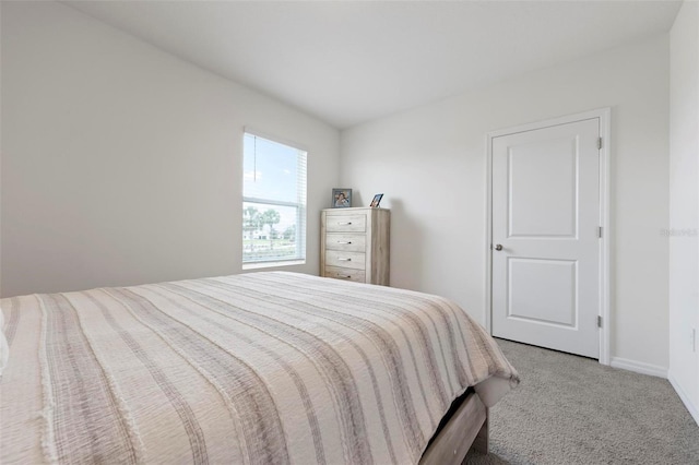 3255 Hilltop Cir, Bradenton, FL 34211 - bedroom featuring carpet flooring and baseboards