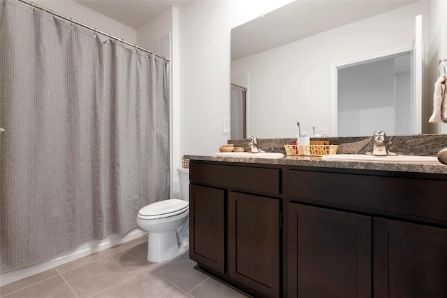 3255 Hilltop Cir, Bradenton, FL 34211 - full bathroom featuring double vanity, tile patterned flooring, and a shower with shower curtain