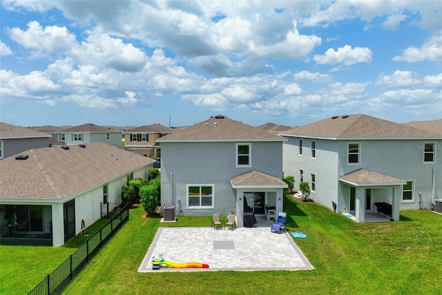 3255 Hilltop Cir, Bradenton, FL 34211 - back of house with a patio, a residential view, stucco siding, a fenced backyard, and a shingled roof