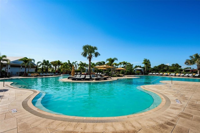 3255 Hilltop Cir, Bradenton, FL 34211 - community pool with a patio