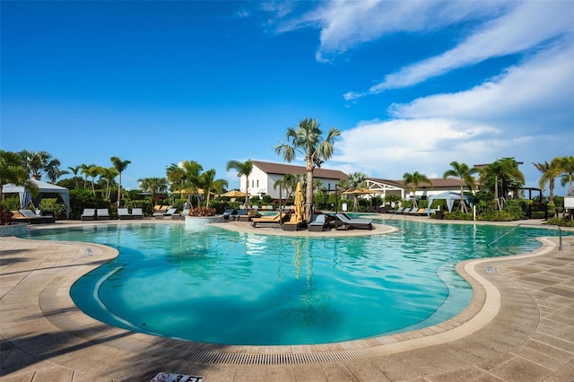 3255 Hilltop Cir, Bradenton, FL 34211 - community pool featuring a patio area
