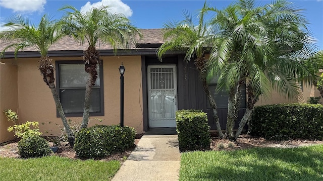 2326 St Marteen Ct, Kissimmee, FL 34741 - property entrance featuring stucco siding