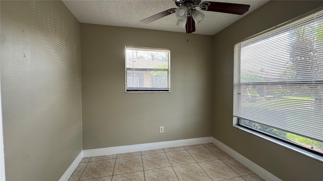 2326 St Marteen Ct, Kissimmee, FL 34741 - spare room with a textured ceiling, light tile patterned floors, and ceiling fan