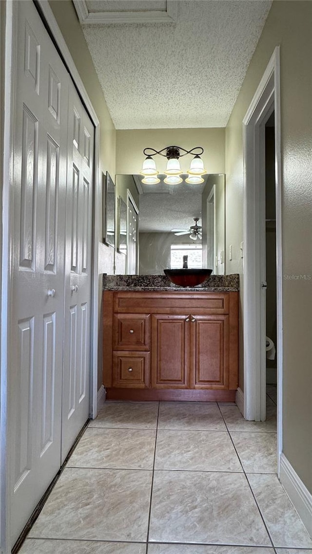 2326 St Marteen Ct, Kissimmee, FL 34741 - bathroom with a textured ceiling and vanity
