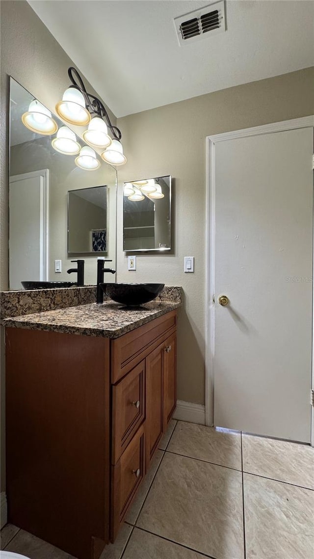 2326 St Marteen Ct, Kissimmee, FL 34741 - bathroom with vanity and tile patterned floors