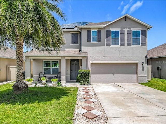 209 Willow Bend Dr, Davenport, FL 33897 - view of front of property featuring stucco siding, covered porch, driveway, and a front yard