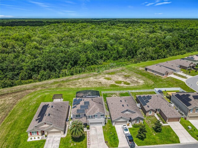 209 Willow Bend Dr, Davenport, FL 33897 - aerial perspective of suburban area featuring a forest