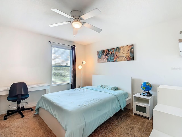 209 Willow Bend Dr, Davenport, FL 33897 - carpeted bedroom featuring a desk and ceiling fan