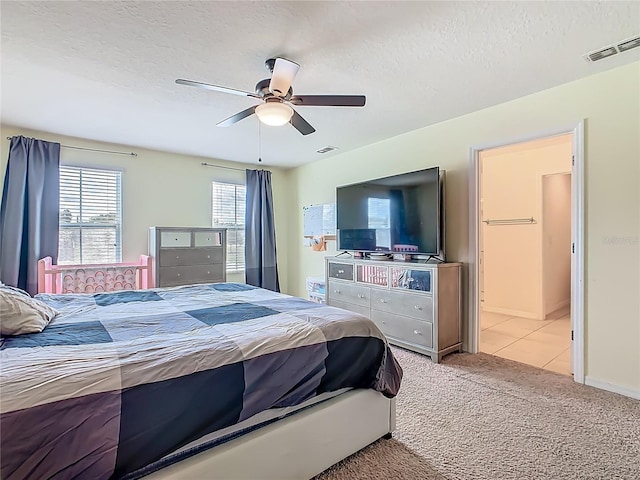 209 Willow Bend Dr, Davenport, FL 33897 - carpeted bedroom featuring a ceiling fan and a textured ceiling