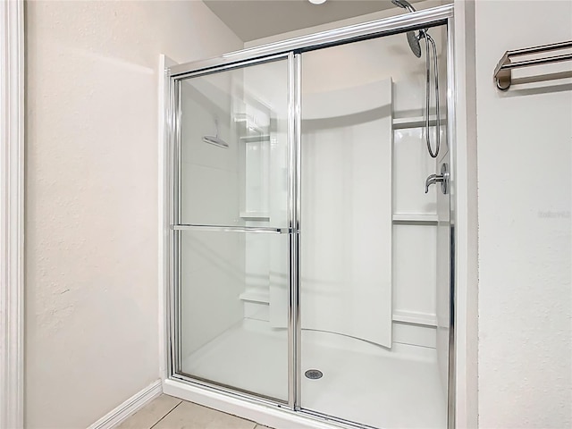 209 Willow Bend Dr, Davenport, FL 33897 - full bathroom with a shower stall and tile patterned floors
