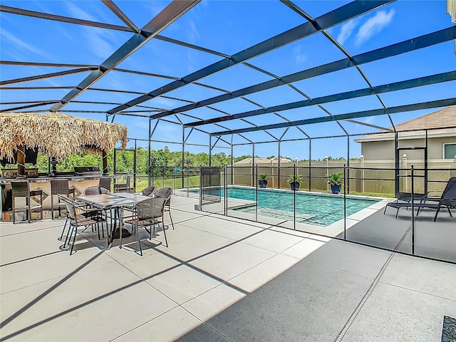 209 Willow Bend Dr, Davenport, FL 33897 - view of pool with exterior kitchen, a patio, and a lanai