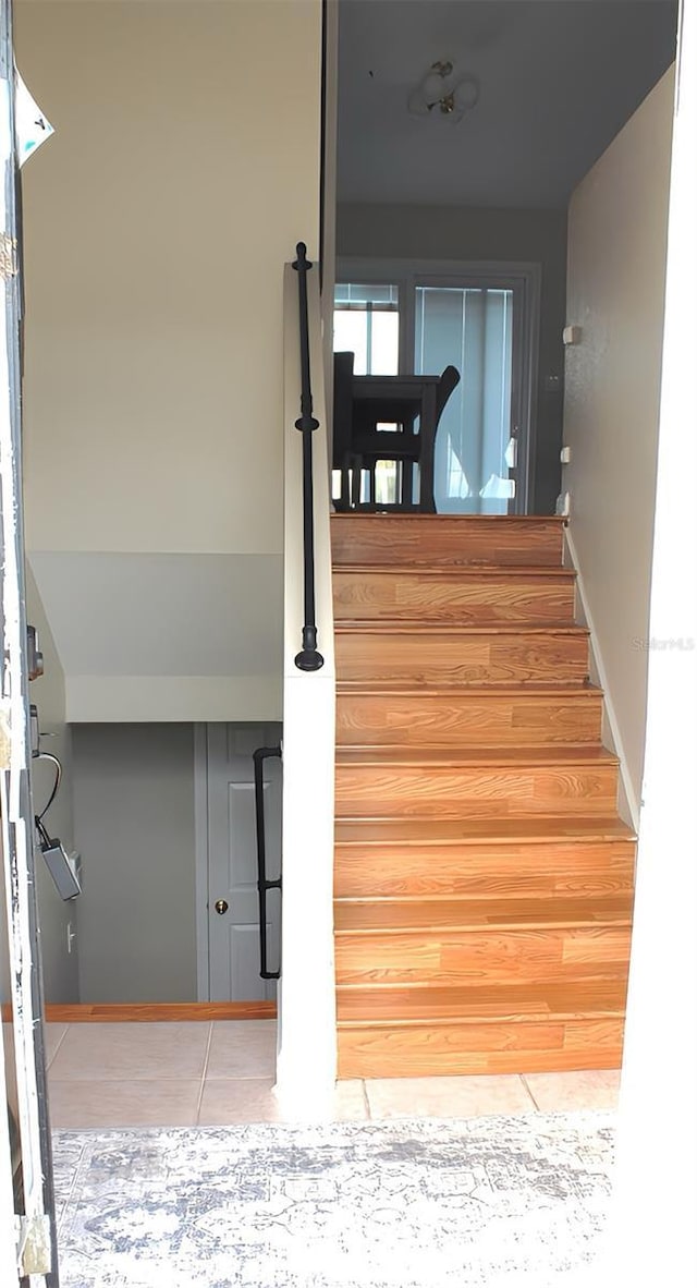 4151 Nelson Rd, Lake Wales, FL 33898 - stairs featuring tile patterned flooring and baseboards