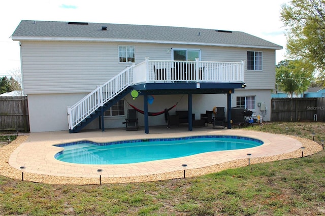 4151 Nelson Rd, Lake Wales, FL 33898 - rear view of property with stairs, a fenced backyard, a wooden deck, a patio, and stucco siding