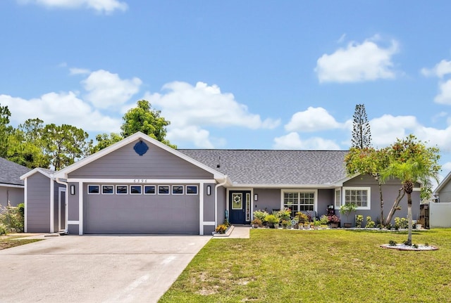 6396 Bennett Ct, Saint Cloud, FL 34771 - ranch-style house with a garage, driveway, and a front lawn