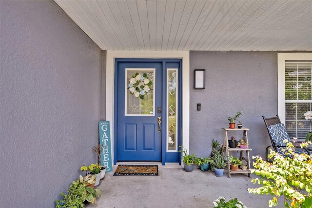 6396 Bennett Ct, Saint Cloud, FL 34771 - property entrance with stucco siding