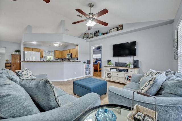 6396 Bennett Ct, Saint Cloud, FL 34771 - living area with ceiling fan, vaulted ceiling, healthy amount of natural light, and light tile patterned flooring