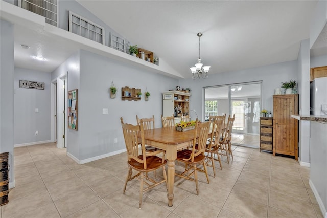 6396 Bennett Ct, Saint Cloud, FL 34771 - dining area featuring a chandelier, light tile patterned flooring, and high vaulted ceiling