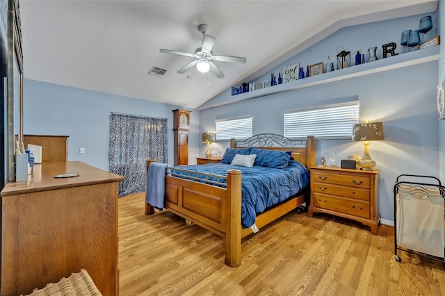 6396 Bennett Ct, Saint Cloud, FL 34771 - bedroom featuring lofted ceiling, light wood-type flooring, and ceiling fan