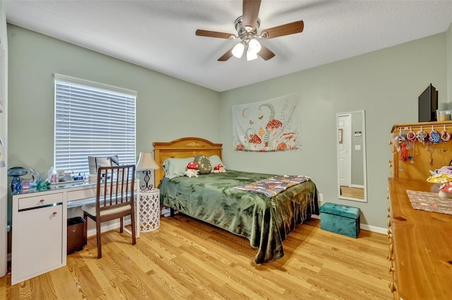 6396 Bennett Ct, Saint Cloud, FL 34771 - bedroom featuring wood finished floors and a ceiling fan