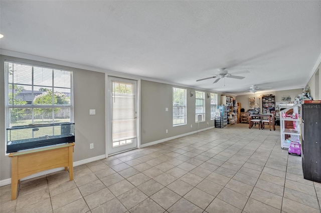 6396 Bennett Ct, Saint Cloud, FL 34771 - living area featuring a ceiling fan, crown molding, and light tile patterned floors