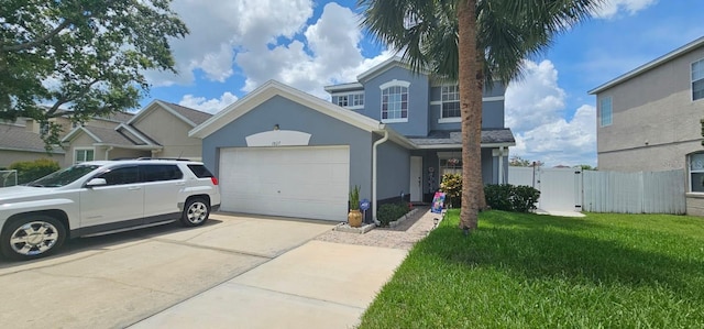 1827 Meadow Pond Way, Orlando, FL 32824 - view of front of property with a garage, stucco siding, driveway, and a gate