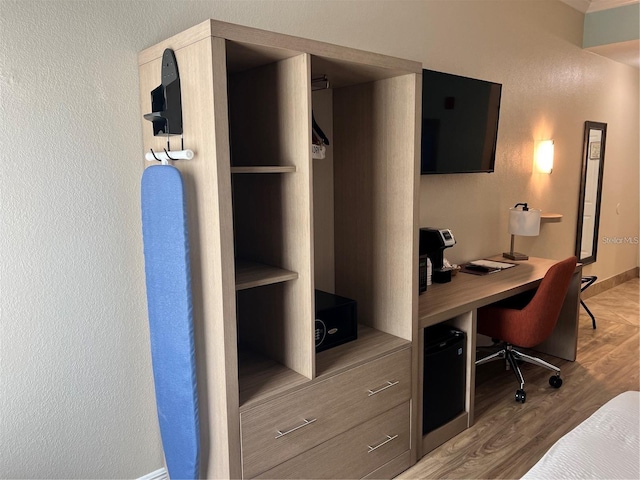 3000 Maingate Ln Unit 414, Kissimmee, FL 34747 - office area with wood finished floors and baseboards