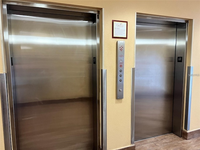 3000 Maingate Ln Unit 414, Kissimmee, FL 34747 - elevator with wood finished floors