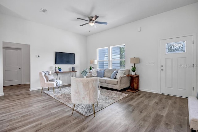 4410 Vicky St, Hastings, FL 32145 - living room featuring a ceiling fan and light wood-style floors