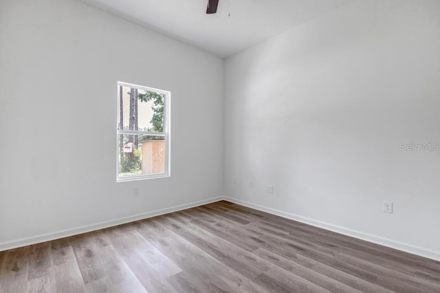 4410 Vicky St, Hastings, FL 32145 - unfurnished room featuring wood finished floors and a ceiling fan