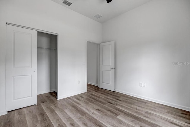 4410 Vicky St, Hastings, FL 32145 - unfurnished bedroom with wood finished floors and a closet