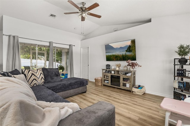 138 Hidden Pointe Ln, Groveland, FL 34736 - living area featuring ceiling fan, vaulted ceiling, and wood finished floors