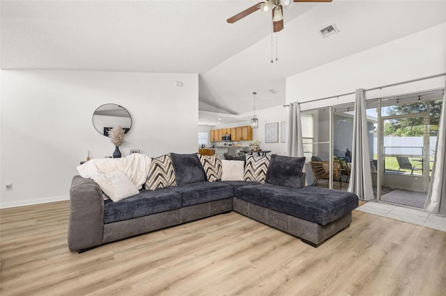 138 Hidden Pointe Ln, Groveland, FL 34736 - living area featuring a ceiling fan, light wood-type flooring, and high vaulted ceiling
