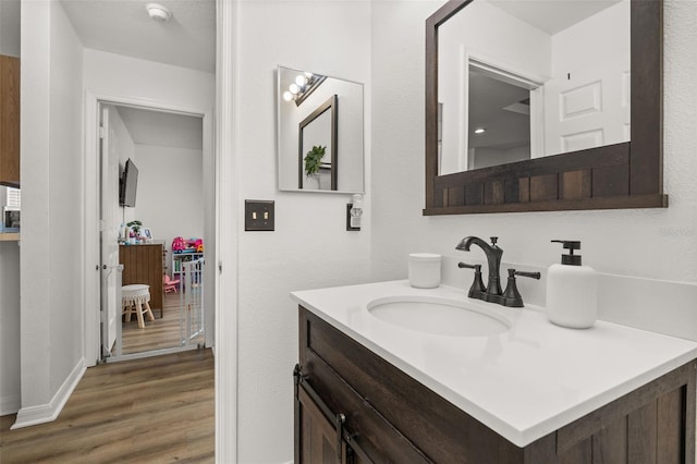 138 Hidden Pointe Ln, Groveland, FL 34736 - bathroom featuring vanity and wood finished floors