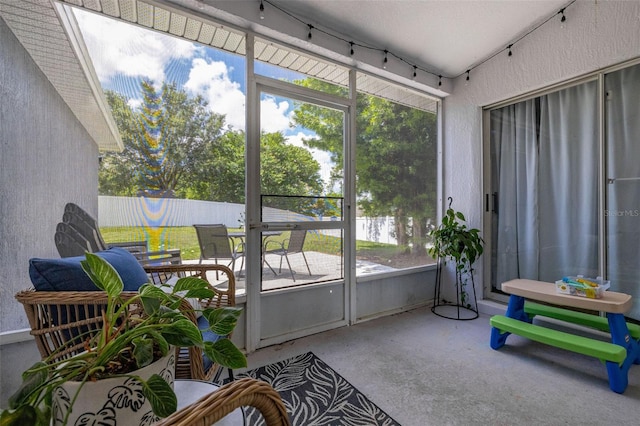 138 Hidden Pointe Ln, Groveland, FL 34736 - sunroom featuring healthy amount of natural light