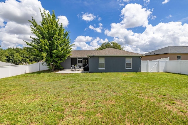 138 Hidden Pointe Ln, Groveland, FL 34736 - rear view of property with stucco siding, a patio area, and a fenced backyard