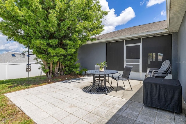 138 Hidden Pointe Ln, Groveland, FL 34736 - view of patio / terrace with a sunroom and outdoor dining area