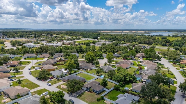 138 Hidden Pointe Ln, Groveland, FL 34736 - aerial view of residential area featuring a large body of water