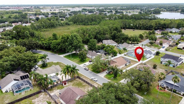 238 Sunridge Woods Blvd, Davenport, FL 33837 - aerial view of property and surrounding area featuring nearby suburban area and a large body of water