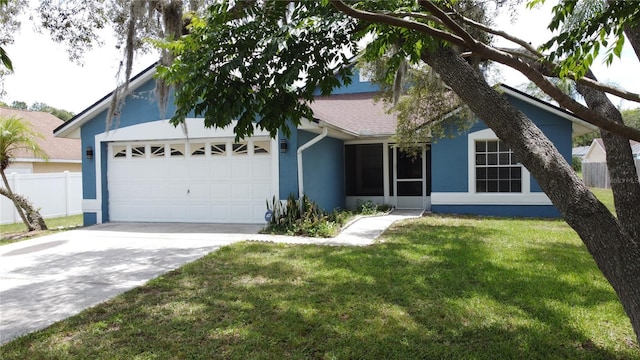 238 Sunridge Woods Blvd, Davenport, FL 33837 - view of front of house with stucco siding, an attached garage, driveway, and roof with shingles