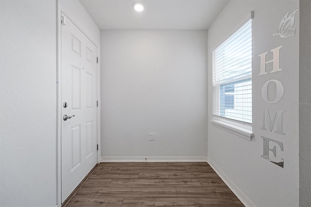 4505 Hummingbird Ln, Haines City, FL 33844 - unfurnished room with dark wood-type flooring and recessed lighting