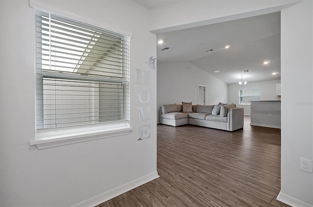 4505 Hummingbird Ln, Haines City, FL 33844 - living room with vaulted ceiling and dark wood finished floors