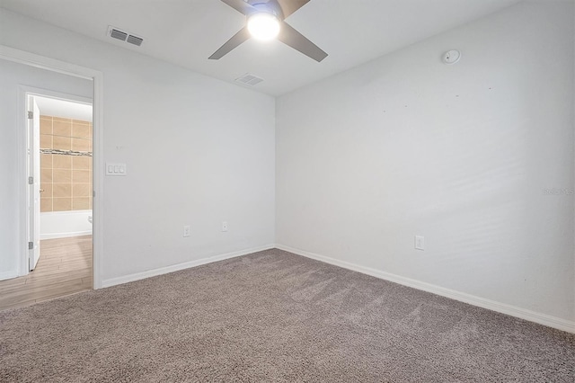 4505 Hummingbird Ln, Haines City, FL 33844 - empty room with ceiling fan, carpet, and a smoke detector