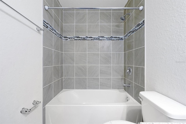 4505 Hummingbird Ln, Haines City, FL 33844 - full bath featuring shower / bathtub combination and a textured wall